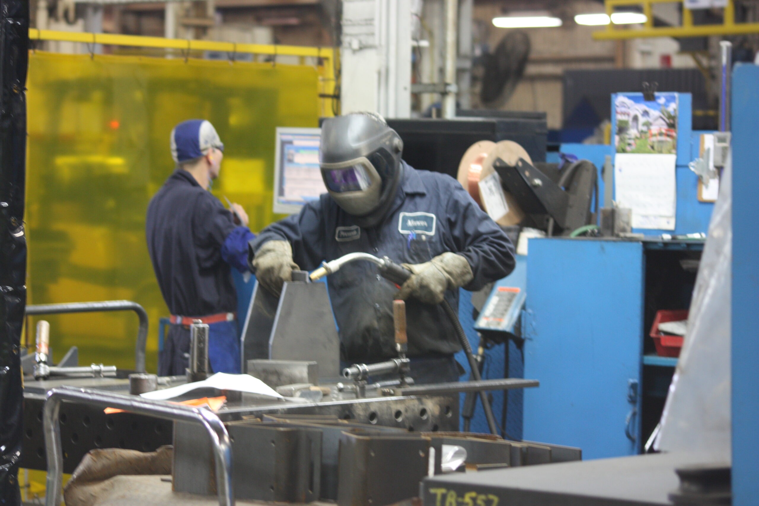 Manufacturing compliance software tracking energy consumption and production metrics in midmarket factory