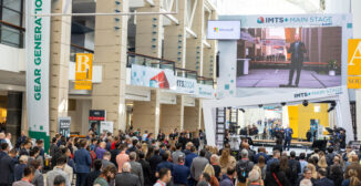 Crowd of manufacturing professionals gathered at the IMTS 2024 Main Stage at McCormick Place in Chicago, the venue for IMTS 2026. Photo courtesy of IMTS.
